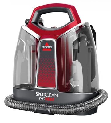 a close up of a red and black vacuum cleaner on a white background