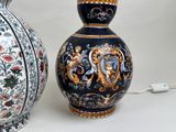 two vases sitting next to each other on a table