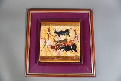 tableau encadré représentant un homme à cheval et une femme à cheval