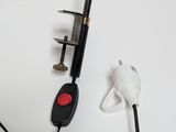 a black and white photo of a hair dryer and a hair dryer