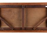 a close up of a wooden frame with a window on it