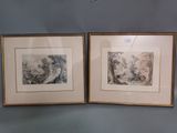 two framed pictures on the wall of a room