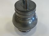 a small metal object that is on a table