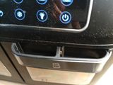a close up of a microwave with buttons on it