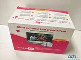 a box that has a picture of a family on it