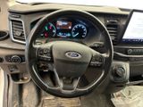 dashboard view of a car with a tablet on the dashboard