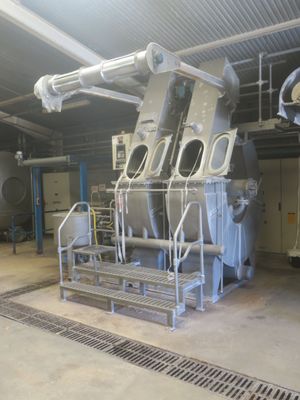 a large machine that is inside of a building