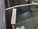 a sticker on the windshield of a car that says vapor