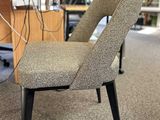 a chair that is sitting in the middle of a room