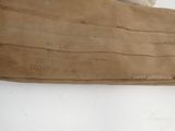 a brown piece of paper with writing on it