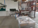a large warehouse filled with lots of boxes and pallets