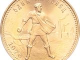 l'image d'une pièce d'or sur laquelle figure un homme tenant une raquette de tennis