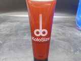 a tube of toothpaste sitting on a sink