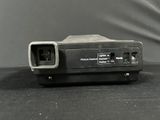 a small projector that is sitting on a table