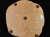 an image of a chocolate chip cookie on a black background