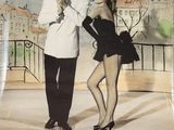 movie poster of a man and a woman dancing on a balcony