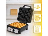 a waffle maker that is sitting on a counter