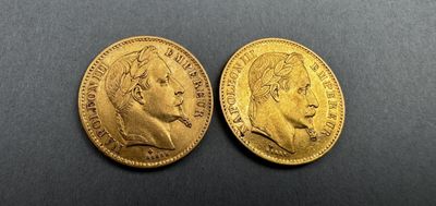 deux souverains en or, dont l'un a une tête d'homme et l'autre une tête de femme