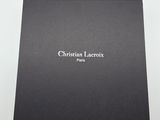 christian lacrox paris box with a black cover and white lettering