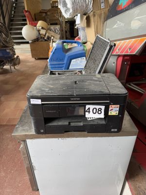 a printer that is sitting on top of a table