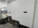 a machine that is sitting inside of a building