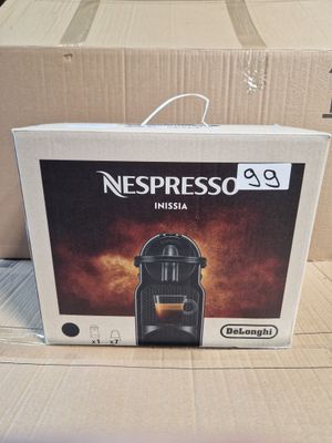 a box that has a coffee machine inside of it