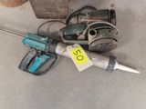 a hammer that is laying on the floor next to a box