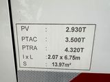 a sign on the side of a bus telling the time