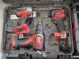 two tools in a case that are sitting on the floor