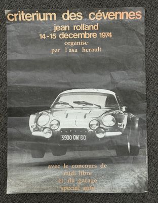 an advertisement for a car show with a picture of a car driving down the road