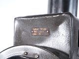 a close up of an old fashioned stove with a clock on it