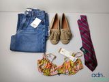 a pair of jeans, a pair of shoes, a tie, and a pair of shoes