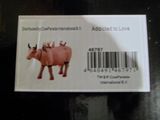 une photo d'une carte sur laquelle figure une vache