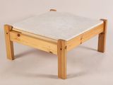 a small wooden table with a marble top on a white background