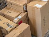many boxes stacked on a pallet in a warehouse