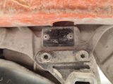 a close up of a metal plate on a motorcycle