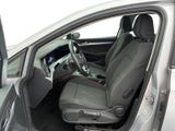 the interior of a car with the door open showing the driver ' s seat area