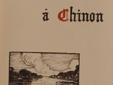 a picture of a book with a picture of a lake
