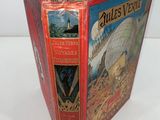 an open book with a picture of a ship on the cover