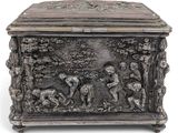 an antique silver box with a scene of a man and a woman in the woods