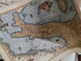 a man holding a large map in his hands