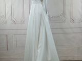 the back of a wedding dress on a mannequin mannequin mannequin mannequin mannequin mannequin mannequin mannequin