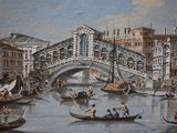a painting of a canal with gondolas in the foreground