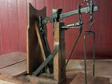 a small machine that is sitting on a wooden table