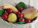 a bowl of fruit that is sitting on a table