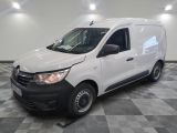 the white van is parked on a checkered tile floor