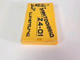 a yellow ticket sitting on top of a white table