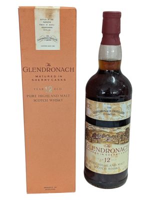 a bottle of glendronach single malt scotch whisky next to a box