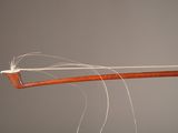 a close up of a bow with a string attached to it