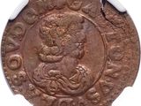 a close up of a coin with an image of a man on it